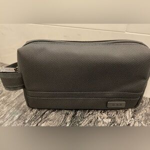 NEW - TUMI Zippered Small Kit - 4”x7” Pouch - Cosmetic Bag - SOLID BLACK